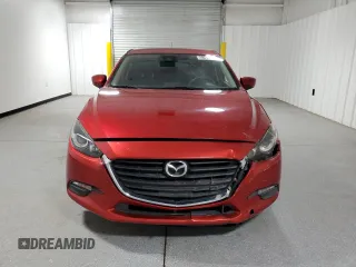 2018 Mazda 3 Touring with VIN 3MZBN1L34JM177605, listed as a Copart auction lot 52559395 with 56,267 mi miles and Clean Title. Bid and sale history available at DreamBid. Image 5.