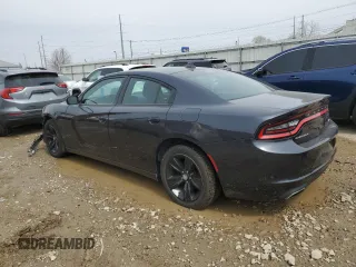 2016 Dodge Charger SXT with VIN 2C3CDXHG0GH121438, listed as a Copart auction lot 52335635 with 211,693 mi miles and Clean Title. Bid and sale history available at carsss.com. Image 2.