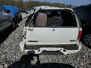 2000 GMC Jimmy SLS Base with VIN 1GKCS18W8YK276338, listed as a Copart auction lot 77056283 with 495,127 mi miles and Salvage Title. Bid and sale history available at carsss.com. Image 6.