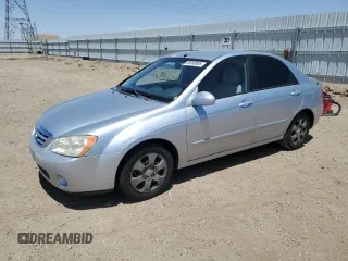 2006 Kia Spectra EX z VIN KNAFE122465234702, wystawiony jako Copart lot #58088885 z przebiegiem 114 726 mil mil oraz Czysty tytuł • Clean title. Historia ofert i sprzedaży dostępna na DreamBid. Obrazek 1.