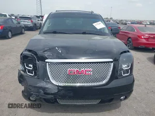 2014 GMC Yukon Denali z VIN 1GKS1EEFXER113493, wystawiony jako IAAI lot #41742662 z przebiegiem 150 382 mil mil oraz . Historia ofert i sprzedaży dostępna na DreamBid. Obrazek 12.