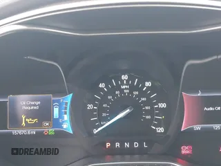 2016 Ford Fusion SE Hybrid with VIN 3FA6P0LU5GR356433, listed as a IAAI auction lot 41799204 with 157,670 mi miles. Bid and sale history available at carsss.com. Image 7.