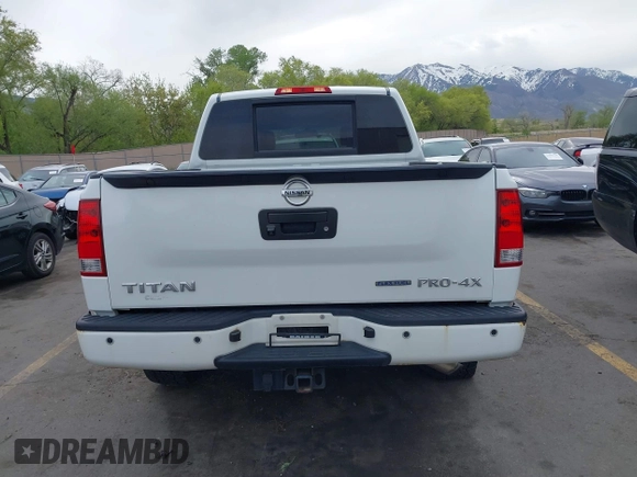 2014 Nissan Titan Pro-4X with VIN 1N6BA0ECXEN501915, listed as a IAAI auction lot 42097967 with 120,851 mi miles and . Bid and sale history available at DreamBid. Image 16.