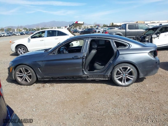 2019 BMW 4 Series 430i with VIN WBA4J1C50KBM17571, listed as a IAAI auction lot 41719938 with 89,552 mi miles. Bid and sale history available at carsss.com. Image 15.