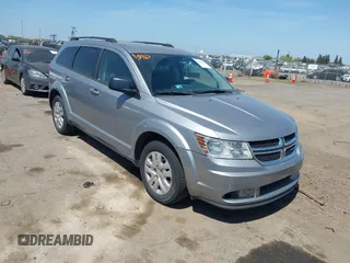 2016 Dodge Journey SE with VIN 3C4PDCAB1GT230387, listed as a IAAI auction lot 42106842 with 157,299 mi miles. Bid and sale history available at carsss.com. Image 1.