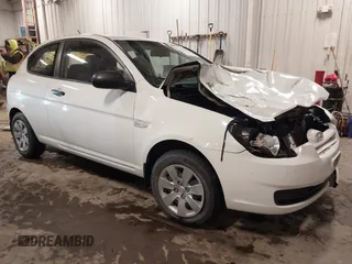 2011 Hyundai Accent GS z VIN KMHCM3AC0BU206860, wystawiony jako IAAI lot #41368833 z przebiegiem 164 545 mil mil oraz . Historia ofert i sprzedaży dostępna na DreamBid. Obrazek 1.