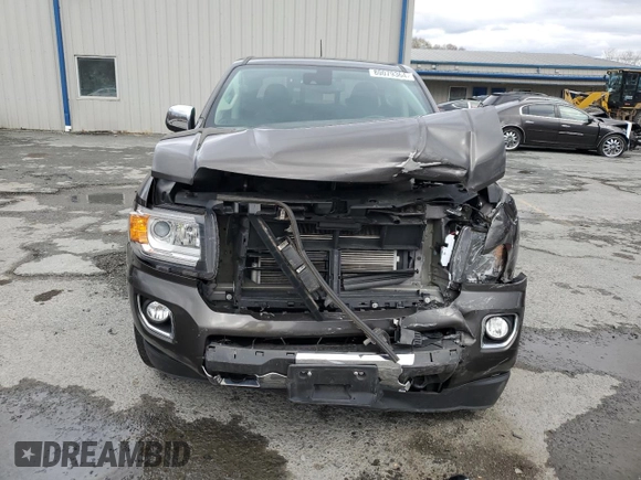 2020 GMC Canyon 4WD Denali with VIN 1GTG6EEN1L1134173, listed as a Copart auction lot 80079364 with 74,708 mi miles and Salvage Title. Bid and sale history available at carsss.com. Image 5.
