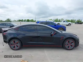 2023 Tesla Model 3 z VIN 5YJ3E1EA5PF484040, wystawiony jako IAAI lot #42128327 z przebiegiem 51 210 mil mil oraz . Historia ofert i sprzedaży dostępna na DreamBid. Obrazek 13.