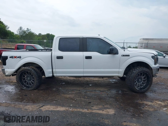 2019 Ford F-150 XL with VIN 1FTEW1EB2KKD98999, listed as a IAAI auction lot 42182839 with 162,098 mi miles and . Bid and sale history available at DreamBid. Image 13.