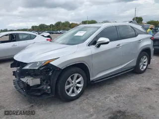 2016 Lexus RX 350 with VIN 2T2ZZMCA1GC006037, listed as a IAAI auction lot 41989511 with 55,071 mi miles. Bid and sale history available at carsss.com. Image 2.