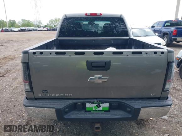 2007 Chevrolet Silverado 1500 LTZ with VIN 2GCEK13M471660691, listed as a IAAI auction lot 42152051 with 210,906 mi miles. Bid and sale history available at carsss.com. Image 6.