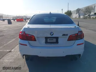 2014 BMW M5 with VIN WBSFV9C55ED593614, listed as a IAAI auction lot 41777369 with 144,076 mi miles. Bid and sale history available at carsss.com. Image 16.