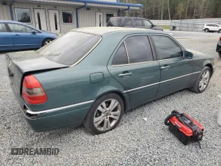 1995 Mercedes-Benz C 230/260/280/320 with VIN WDBHA28E3SF241951, listed as a Copart auction lot 50332845 with 236,068 mi miles and Salvage title. Bid and sale history available at DreamBid. Image 3.