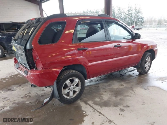 2009 Kia Sportage LX with VIN KNDJE723597600071, listed as a IAAI auction lot 41859059 with 135,760 mi miles. Bid and sale history available at carsss.com. Image 4.