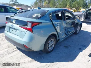 2020 Toyota Prius L Eco with VIN JTDKARFU8L3121625, listed as a IAAI auction lot 41700747 with 79,721 mi miles. Bid and sale history available at carsss.com. Image 4.