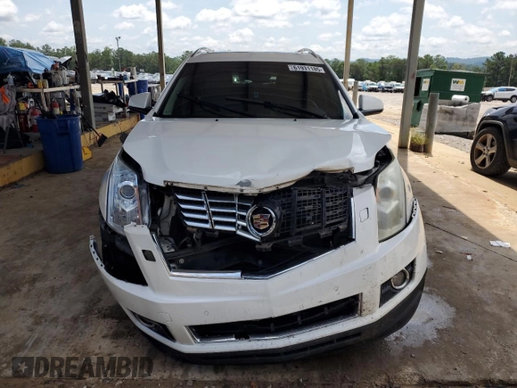 2013 Cadillac SRX Premium Collection with VIN 3GYFNEE30DS529808, listed as a Copart auction lot 61931185 with 131,245 mi miles and Salvage title. Bid and sale history available at DreamBid. Image 5.