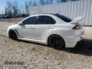 2015 Mitsubishi Lancer Evolution Final Edition z VIN JA32W7FV8FU028275, wystawiony jako Copart lot #77591623 z przebiegiem 44 124 mil mil oraz . Historia ofert i sprzedaży dostępna na DreamBid. Obrazek 2.