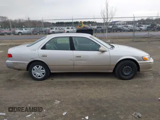 2001 Toyota Camry CE with VIN 4T1BG22K51U046766, listed as a IAAI auction lot 41674202 with 148,581 mi miles. Bid and sale history available at carsss.com. Image 13.