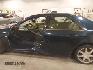 2005 Cadillac STS with VIN 1G6DC67AX50201697, listed as a IAAI auction lot 41822466 with 122,089 mi miles. Bid and sale history available at carsss.com. Image 14.