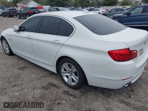 2013 BMW 5 Series 528i xDrive with VIN WBAXH5C5XDD106981, listed as a IAAI auction lot 42012477 with 140,259 mi miles. Bid and sale history available at carsss.com. Image 3.