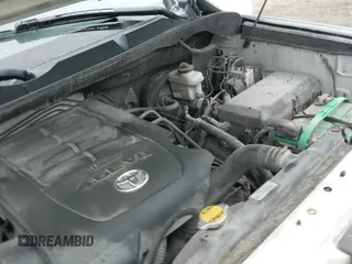 2014 Toyota Tundra SR z VIN 5TFUM5F16EX053318, wystawiony jako IAAI lot #41995442 z przebiegiem 162 235 mil mil oraz . Historia ofert i sprzedaży dostępna na DreamBid. Obrazek 18.