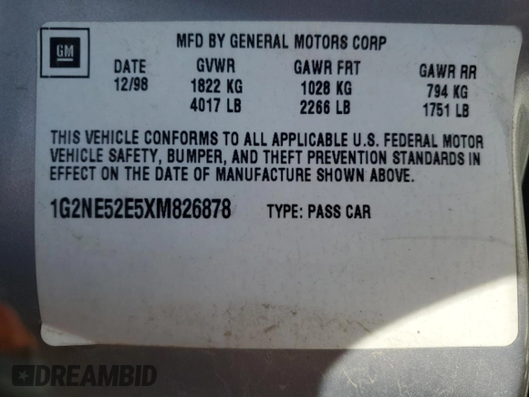 1999 Pontiac Grand Am SE2 with VIN 1G2NE52E5XM826878, listed as a Copart auction lot 77351164 with 241,463 mi miles and Salvage Title. Bid and sale history available at carsss.com. Image 12.