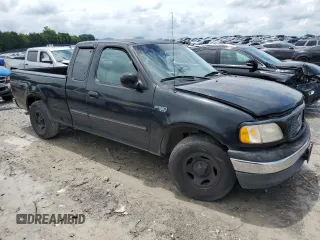 2000 Ford F-150 XL with VIN 1FTZX1720YNB83091, listed as a Copart auction lot 42765835 with 0 mi miles and Salvage Title. Bid and sale history available at carsss.com. Image 4.
