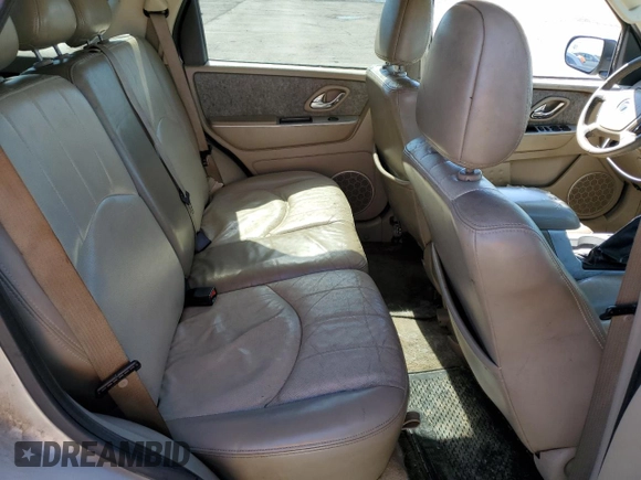 2007 Mercury Mariner Luxury with VIN 4M2YU91147KJ04454, listed as a Copart auction lot 49666005 with 198,627 mi miles and Salvage title. Bid and sale history available at DreamBid. Image 11.