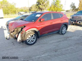 2020 Hyundai Tucson SE with VIN KM8J23A49LU243641, listed as a IAAI auction lot 41794008 with 79,613 mi miles. Bid and sale history available at carsss.com. Image 2.