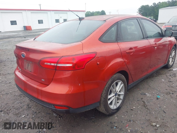 2018 Ford Focus SE with VIN 1FADP3F25JL265039, listed as a IAAI auction lot 42352050 with 140,127 mi miles and . Bid and sale history available at DreamBid. Image 4.