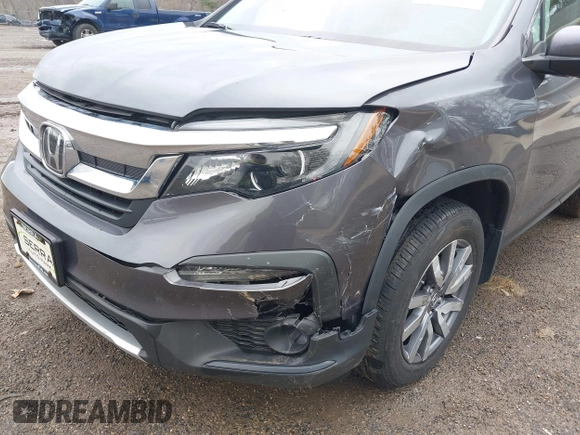 2020 Honda Pilot EX-L z VIN 5FNYF6H53LB059294, wystawiony jako IAAI lot #41910511 z przebiegiem 55 737 mil mil oraz . Historia ofert i sprzedaży dostępna na DreamBid. Obrazek 6.