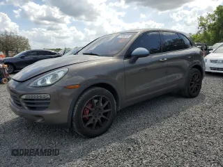 2011 Porsche Cayenne S с VIN WP1AB2A26BLA44787, выставлен на аукционе Copart как лот 51590815 с пробегом 116 344 миль миль и Списание • Salvage title. История ставок и продаж доступна на DreamBid. Изображение 1.
