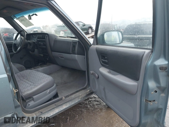 1997 Jeep Cherokee Sport with VIN 1J4FJ68S9VL607515, listed as a IAAI auction lot 41216502 with 238,274 mi miles. Bid and sale history available at carsss.com. Image 5.
