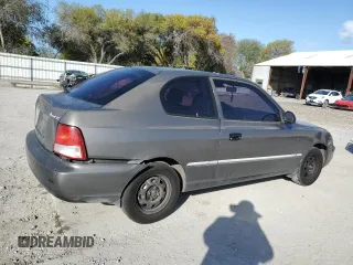 2002 Hyundai Accent GL with VIN KMHCG35C72U192411, listed as a Copart auction lot 85322524 with 130,977 mi miles and Salvage Title. Bid and sale history available at carsss.com. Image 3.