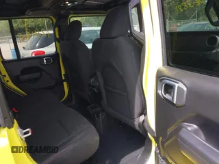 2023 Jeep Wrangler Sport with VIN 1C4HJXDG5PW693865, listed as a IAAI auction lot 40068881 with 12,149 mi miles and . Bid and sale history available at DreamBid. Image 8.