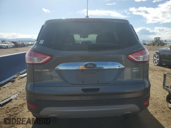 2013 Ford Escape SEL с VIN 1FMCU9H91DUD38428, выставлен на аукционе Copart как лот 57466025 с пробегом 106 858 миль миль и Списание • Salvage title. История ставок и продаж доступна на DreamBid. Изображение 6.