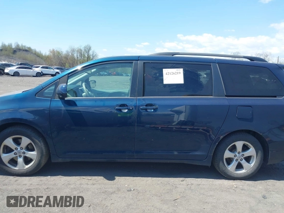 2012 Toyota Sienna LE AAS with VIN 5TDKK3DC7CS274726, listed as a IAAI auction lot 42126219 with 184,158 mi miles. Bid and sale history available at carsss.com. Image 14.