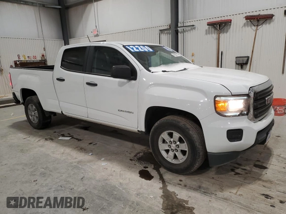 2015 GMC Canyon 2WD with VIN 1GTG5AE35F1172598, listed as a Copart auction lot 41620115 with 135,864 mi miles and Salvage Title. Bid and sale history available at DreamBid. Image 4.