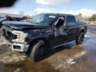 2018 Ford F-150 XL with VIN 1FTEW1E54JFB74361, listed as a Copart auction lot 45293295 with 153,456 mi miles and Salvage Title. Bid and sale history available at carsss.com. Image 1.