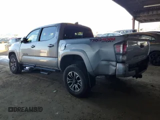 2021 Toyota Tacoma SR with VIN 3TMCZ5AN6MM393306, listed as a Copart auction lot 41483325 with 57,217 mi miles and Salvage title. Bid and sale history available at DreamBid. Image 2.