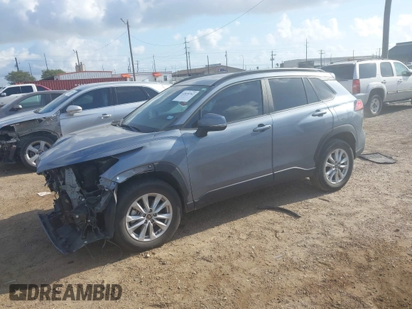 2022 Toyota Corolla Cross LE with VIN 7MUCAAAG0NV018245, listed as a IAAI auction lot 42039762 with 26,690 mi miles and . Bid and sale history available at DreamBid. Image 2.