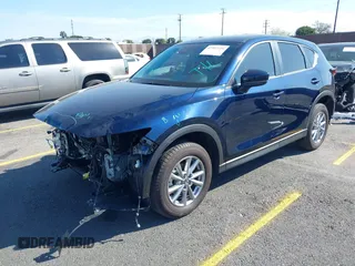 2023 Mazda CX-5 S Carbon Edition z VIN JM3KFBCM7P0197669, wystawiony jako IAAI lot #41992110 z przebiegiem 15 476 mil mil oraz . Historia ofert i sprzedaży dostępna na DreamBid. Obrazek 17.