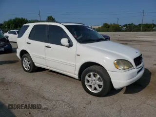 2000 Mercedes-Benz M-Class with VIN 4JGAB72E8YA200237, listed as a Copart auction lot 65765134 with 194,399 mi miles and Clean Title. Bid and sale history available at carsss.com. Image 4.