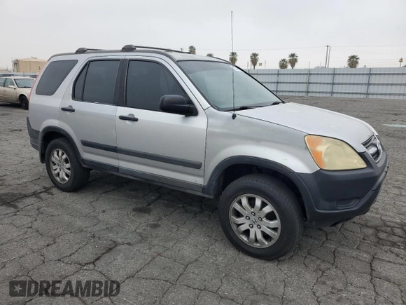 2002 Honda CR-V LX with VIN JHLRD684X2C024784, listed as a Copart auction lot 52049605 with 242,438 mi miles and Salvage Title. Bid and sale history available at carsss.com. Image 4.