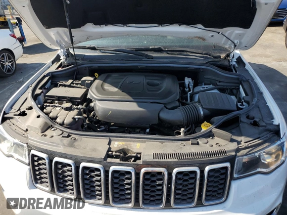 2021 Jeep Grand Cherokee Laredo E with VIN 1C4RJEAGXMC719497, listed as a Copart auction lot 60830315 with 3,873 mi miles and Salvage title. Bid and sale history available at DreamBid. Image 12.