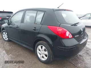 2009 Nissan Versa 1.8 SL with VIN 3N1BC13EX9L390055, listed as a IAAI auction lot 41455877 with 126,718 mi miles. Bid and sale history available at carsss.com. Image 3.
