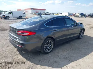 2019 Ford Fusion SEL with VIN 3FA6P0CD7KR159644, listed as a IAAI auction lot 40280287 with 57,329 mi miles. Bid and sale history available at carsss.com. Image 4.