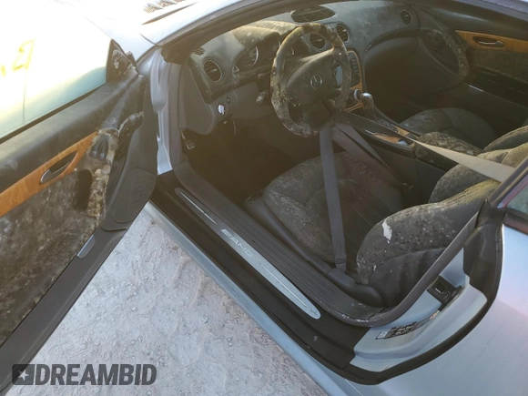 2004 Mercedes-Benz SL 55/63 AMG с VIN WDBSK74F64F071683, выставлен на аукционе Copart как лот 75084534 с пробегом Не указан миль и Списание • Salvage title. История ставок и продаж доступна на DreamBid. Изображение 8.
