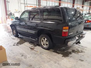 2003 Chevrolet Tahoe LT with VIN 1GNEC13Z43J340111, listed as a IAAI auction lot 41574135 with 251,307 mi miles. Bid and sale history available at carsss.com. Image 3.