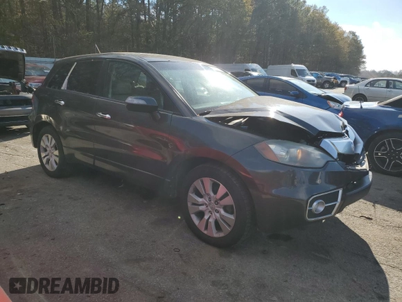 2010 Acura RDX with VIN 5J8TB1H22AA000372, listed as a Copart auction lot 83189334 with 220,824 mi miles and Salvage Title. Bid and sale history available at carsss.com. Image 4.